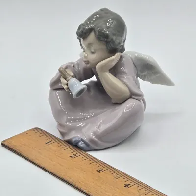 LOT 29L: Retired Lladro "Heavenly Chimes" Porcelain Figurine