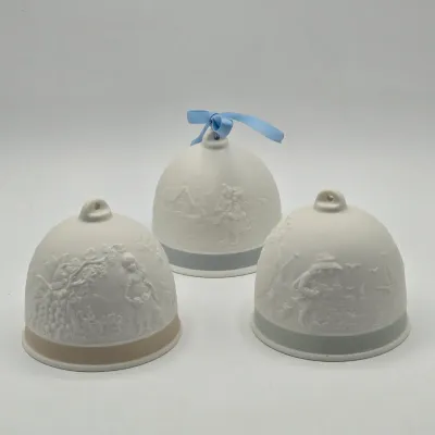 LOT 44L: Three Matte Porcelain Bell Ornaments from the Vintage Lladró Four Seasons Collector’s Society Series
