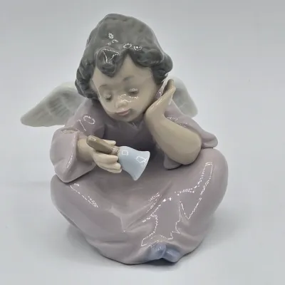LOT 29L: Retired Lladro "Heavenly Chimes" Porcelain Figurine