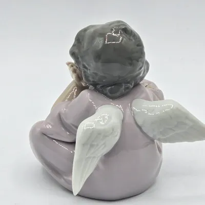 LOT 29L: Retired Lladro "Heavenly Chimes" Porcelain Figurine