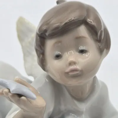 LOT 27L: Retired Lladró "Making a Wish" Angel Porcelain Figurine