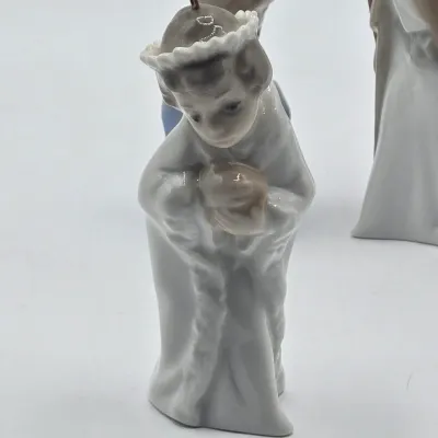 LOT 26L: Set of Retired Lladró Porcelain Nativity Ornaments Depicting the Holy Family and the Three Wise Men as Children