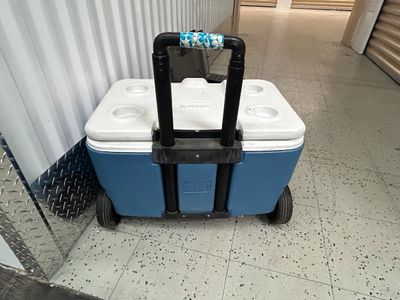 Sale Photo Thumbnail #118: Pull handle is broke in the center of cooler and grill could use a good cleaning