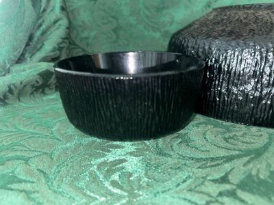 Sale Photo Thumbnail #639: VINTAGE INDIANA GLASS BLACK textured nesting bowl set. Features 1 large serving bowl and 2 matching smaller bowls. Textured bark-like exterior with smooth interior. Good condition with no visible chips or cracks.