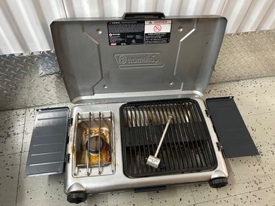 Sale Photo Thumbnail #116: Pull handle is broke in the center of cooler and grill could use a good cleaning