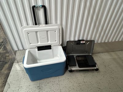 Sale Photo Thumbnail #107: Pull handle is broke in the center of cooler and grill could use a good cleaning