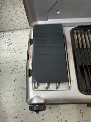 Sale Photo Thumbnail #120: Pull handle is broke in the center of cooler and grill could use a good cleaning
