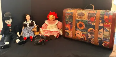 A Lot Of Collectible Figures (Raggedy Ann, Charlie Chaplin and Dorothy & Toto)