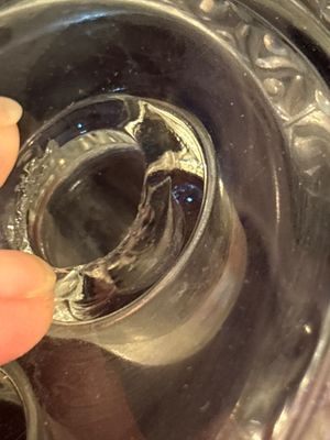 Sale Photo Thumbnail #396: Small chips in base as shown in pictures. Does not affect the vases being held in the bowl.