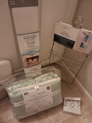 NEW 6 PC TOWEL SET, NEW BATH PILLOW, SHOWER CADDY, STEP TRASH CAN, UNDER THE SINK MAT