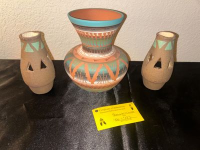 CENTER POTTERY PIECE BY NAVAJO ARTIST SHAWN WILLIAMS AND ACCOMPANYING CANDLE. HOLDERS