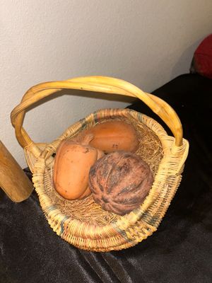 BLANKET LADDER, WICKER BASKET AND CLAY VEGETABLES