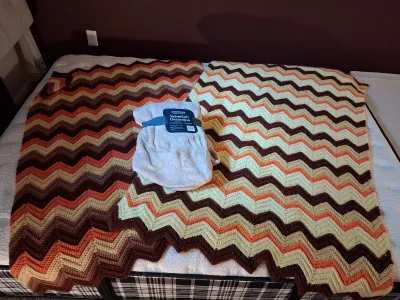 TWO CROCHET THROW BLANKETS, BERKSHIRE VELVETSOFT THROW