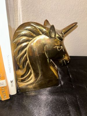 BRASS UNICORN BOOK ENDS AND HARDBACK BOOKS