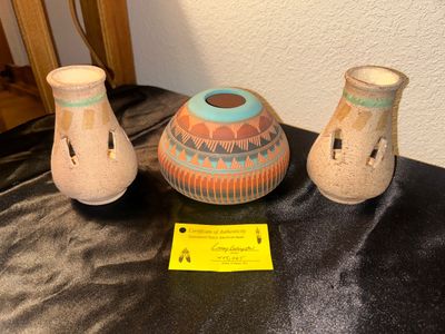 NAVAJO POTTERY PIECE BY ARTIST LARRY LUCKYSTAR AND LIKE CANDLE HOLDERS
