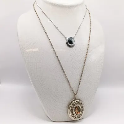 LOT 111: Faux Amber-Incased Scorpion Pendant on a Sarah Coventry Chain, Sarah Coventry Hematite Necklace & More