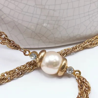 LOT 27: Vintage Vanna White Pearl Necklace, Multi-Strand Beaded Necklace, Gold-Tone Pendant Bracelet & More
