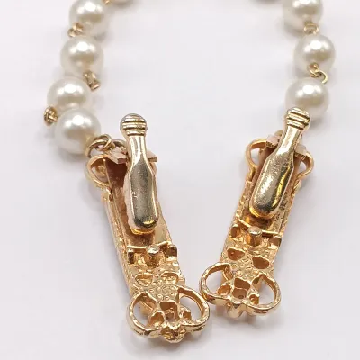 LOT 114: Pearl 1/20 12K GF and Pink Rhinestone Flower Brooch, Vintage Sweater Clips & More