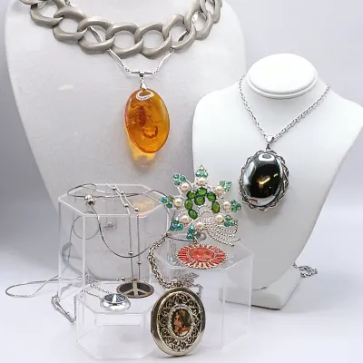 LOT 111: Faux Amber-Incased Scorpion Pendant on a Sarah Coventry Chain, Sarah Coventry Hematite Necklace & More