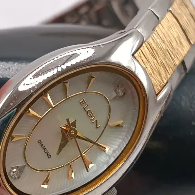 LOT 115: Vintage Watch Collection- Sakata Pocket Watch, Elgin, Timex & Pulsar
