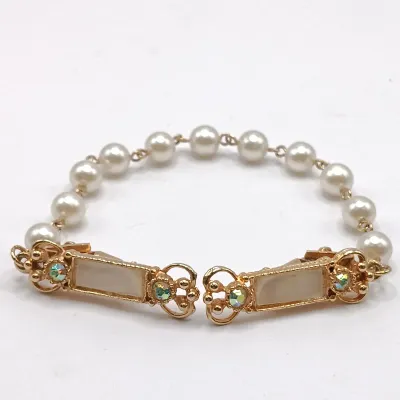 LOT 114: Pearl 1/20 12K GF and Pink Rhinestone Flower Brooch, Vintage Sweater Clips & More