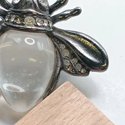 LOT 110: Lucite Jelly Belly Bee Pin, Alpaca Silver Pins and Earrings & More