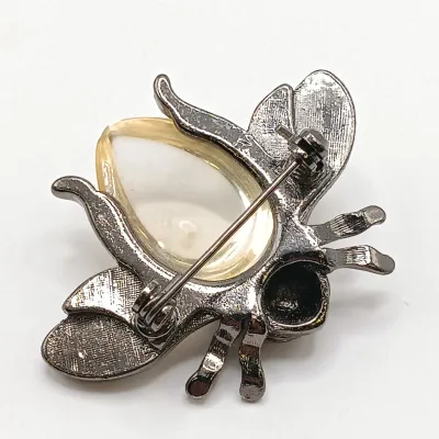 LOT 110: Lucite Jelly Belly Bee Pin, Alpaca Silver Pins and Earrings & More
