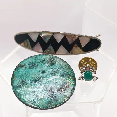 LOT 110: Lucite Jelly Belly Bee Pin, Alpaca Silver Pins and Earrings & More