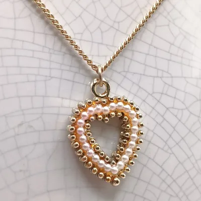 LOT 27: Vintage Vanna White Pearl Necklace, Multi-Strand Beaded Necklace, Gold-Tone Pendant Bracelet & More