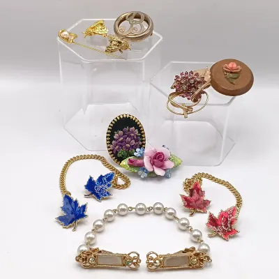 LOT 114: Pearl 1/20 12K GF and Pink Rhinestone Flower Brooch, Vintage Sweater Clips & More