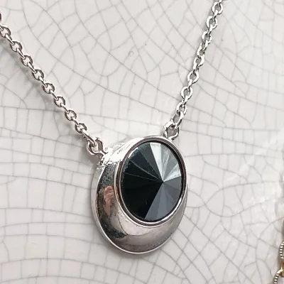 LOT 111: Faux Amber-Incased Scorpion Pendant on a Sarah Coventry Chain, Sarah Coventry Hematite Necklace & More