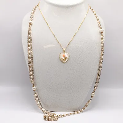 LOT 27: Vintage Vanna White Pearl Necklace, Multi-Strand Beaded Necklace, Gold-Tone Pendant Bracelet & More