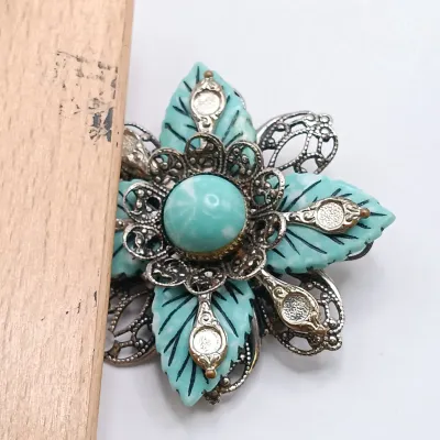 LOT 110: Lucite Jelly Belly Bee Pin, Alpaca Silver Pins and Earrings & More