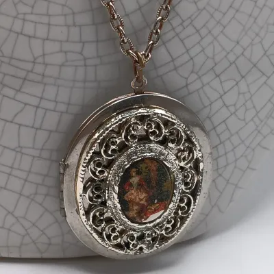 LOT 111: Faux Amber-Incased Scorpion Pendant on a Sarah Coventry Chain, Sarah Coventry Hematite Necklace & More