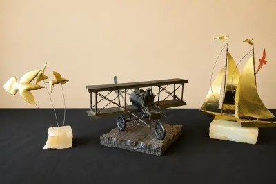 VINTAGE SIGNED YOSI SAILBOAT SCULPTURE AND MORE
