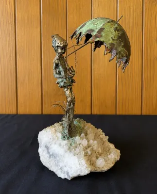 BRONZE SCULPTURE OF GIRL UNDER UMBRELLA 