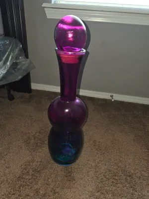 Large decorative glass bottle