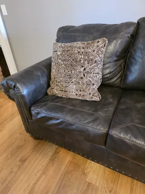 Brown leather style sofa