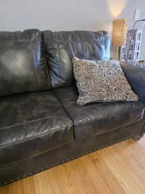 Brown leather style sofa