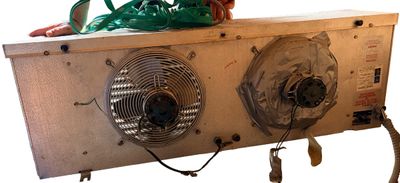 Sale Photo Thumbnail #296: dual-fan commercial refrigeration unit or evaporator coil with wire fan guards and an insulated casing