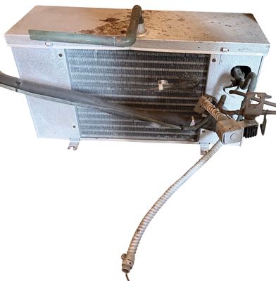 Sale Photo Thumbnail #298: dual-fan commercial refrigeration unit or evaporator coil with wire fan guards and an insulated casing
