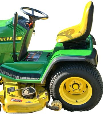Sale Photo Thumbnail #151: John Deere GT275 Garden Tractor with a Yellow seat, a Mower deck, and Extra Wheel