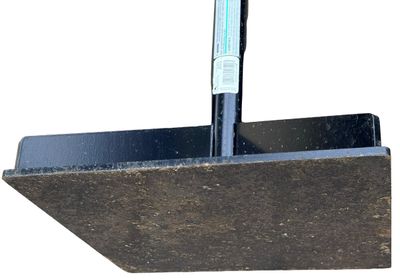 Sale Photo Thumbnail #586: Heavy-Duty Manual Hand Tamper with a Flat Metal Base and a Long Vertical Handle, used for compacting and leveling soil, gravel, or paving materials