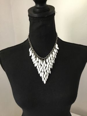 Beautiful, silver toned, go milk, glass statement necklace. Very nice quality excellent condition.