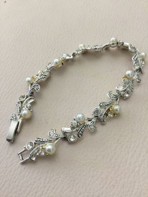 Gorgeous, silver plated, crystal rhinestone bow, pearl tennis bracelet