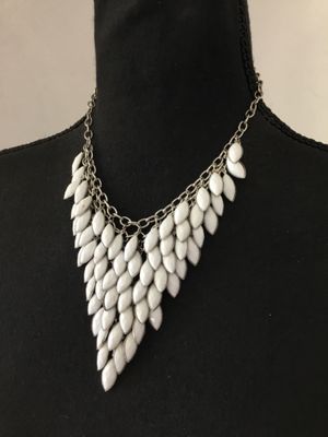 Beautiful, silver toned, go milk, glass statement necklace. Very nice quality excellent condition.