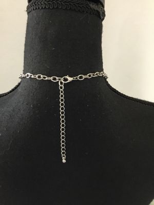 Beautiful, silver toned, go milk, glass statement necklace. Very nice quality excellent condition.