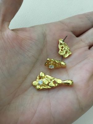 Gold tone, pendant, and matching earring set