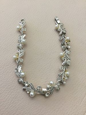 Gorgeous, silver plated, crystal rhinestone bow, pearl tennis bracelet