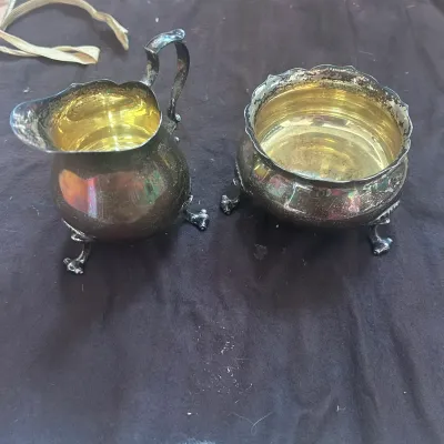 A sterling silver cream and sugar